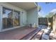 Back patio with sliding glass doors and air conditioning unit at 2820 Somerset Park Dr # 101, Tampa, FL 33613