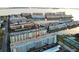 A beautiful aerial view of the condo and surrounding community that includes marina and ocean views at 2850 59Th S St # 310, Gulfport, FL 33707