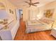 Bright main bedroom featuring wood-look flooring, double closets and plenty of space at 2850 59Th S St # 310, Gulfport, FL 33707