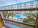 Enjoy this spectacular pool view from the home's screened in window at 2850 59Th S St # 310, Gulfport, FL 33707