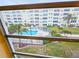Enjoy this spectacular pool view from the home's screened in window at 2850 59Th S St # 310, Gulfport, FL 33707