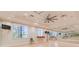 Community exercise room with mirrors, natural light, workout balls, and hard wood floors at 30410 Ceasar Park Dr, Wesley Chapel, FL 33543