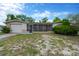 Charming single-story home with a screened-in porch and attached one car garage at 3547 Odom Dr, New Port Richey, FL 34652