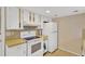 Functional kitchen with appliances and ample cabinet storage at 3547 Odom Dr, New Port Richey, FL 34652