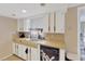 Practical kitchen featuring a stainless steel sink and plentiful countertop space at 3547 Odom Dr, New Port Richey, FL 34652