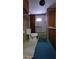 Bathroom featuring a toilet, vanity, and a bathtub with shower at 37229 Lois Ave, Zephyrhills, FL 33542