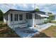 Cute single-story home featuring an entrance with steps and a awning at 37229 Lois Ave, Zephyrhills, FL 33542