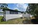 Exterior home with back yard view at 37229 Lois Ave, Zephyrhills, FL 33542
