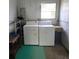 Laundry area featuring washer and dryer at 37229 Lois Ave, Zephyrhills, FL 33542