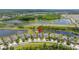Aerial shot showing a community surrounded by multiple ponds at 3972 Wisdom Trl, Land O Lakes, FL 34638