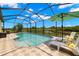 Relaxing screened lanai with a private pool and lovely views of the backyard at 3972 Wisdom Trl, Land O Lakes, FL 34638
