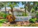 Community sign for 'The Preserve' is surrounded by lush landscaping at 423 Fan Palm Ne Ct, St Petersburg, FL 33703