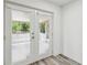Patio access featuring double doors at 4608 Deltona Blvd, Spring Hill, FL 34606