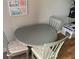 Cozy dining area with a round table and comfortable seating, perfect for everyday meals at 51 Island Way # 309, Clearwater Beach, FL 33767