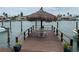 This dock offers outdoor seating with an umbrella at 51 Island Way # 309, Clearwater Beach, FL 33767