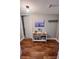 Inviting entryway featuring a decorative console table with coastal accents and wood-look flooring at 51 Island Way # 309, Clearwater Beach, FL 33767