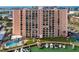 Condo building with pool and boat docks offers waterfront living and easy access to the bay at 51 Island Way # 309, Clearwater Beach, FL 33767