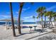 Beach with shaded pavilions, picnic tables, and barbecue grills, ideal for gatherings and relaxation at 5529 White Marlin Ct, New Port Richey, FL 34652