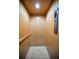 Interior view of a modern elevator, featuring tile floors and wood paneled walls at 5529 White Marlin Ct, New Port Richey, FL 34652