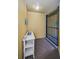 Entryway with a small table, a gate, and yellow-painted walls at 5529 White Marlin Ct, New Port Richey, FL 34652