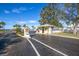 Entrance to a community with a security gate, landscaping and view of the Gulf at 5529 White Marlin Ct, New Port Richey, FL 34652