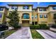 Beautiful multi-story townhome with a front-loading garage and a cozy second-story balcony at 5529 White Marlin Ct, New Port Richey, FL 34652