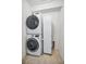 Convenient laundry area with stackable washer and dryer at 5529 White Marlin Ct, New Port Richey, FL 34652