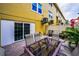 Outdoor patio features stylish furniture and a sliding glass door to indoor living space at 5529 White Marlin Ct, New Port Richey, FL 34652