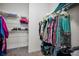 Walk-in closet featuring wire shelving and clothing racks at 5529 White Marlin Ct, New Port Richey, FL 34652