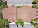 Overhead shot of two buildings featuring well-kept roofs and ample parking at 5705 Baywater Dr # 5705, Tampa, FL 33615