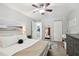 This bright bedroom offers carpet flooring, closet space, and neutral paint at 5705 Baywater Dr # 5705, Tampa, FL 33615