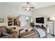 Spacious living room that opens to the kitchen, featuring a vaulted ceiling and comfortable seating at 5705 Baywater Dr # 5705, Tampa, FL 33615