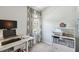 The home office offers a spacious work area and ample storage shelves at 5705 Baywater Dr # 5705, Tampa, FL 33615