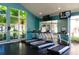 This fitness center offers multiple treadmills and floor-to-ceiling windows for a pleasant view at 5705 Baywater Dr # 5705, Tampa, FL 33615