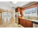 The spacious kitchen has stone countertops and stainless steel appliances at 6212 N Grady Ave, Tampa, FL 33614