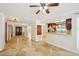 Spacious living room features tile flooring, open access to the kitchen, and dining area at 6212 N Grady Ave, Tampa, FL 33614