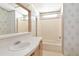 Functional bathroom featuring a tub and a single sink at 6226 Florence St, Gibsonton, FL 33534