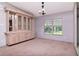 Dining room with a built in cabinet at 6226 Florence St, Gibsonton, FL 33534