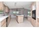 Bright kitchen with island and lots of storage at 6226 Florence St, Gibsonton, FL 33534