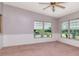 Living room with bright windows at 6226 Florence St, Gibsonton, FL 33534