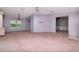Spacious living room featuring a ceiling fan and window at 6226 Florence St, Gibsonton, FL 33534