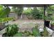 Large backyard under canopy with mature trees, offering a private, green space at 6741 4Th Ave N, St Petersburg, FL 33710