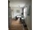 Bright dining area with a white dining set, window seat, and natural lighting at 6741 4Th Ave N, St Petersburg, FL 33710