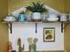 Kitchenette with open shelving and a gold faucet at 6741 4Th Ave N, St Petersburg, FL 33710