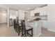 Well-equipped kitchen with a breakfast bar, stainless steel appliances, and ample counter space at 7119 Amelia River Dr, Parrish, FL 34219
