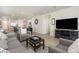 Cozy living room with a neutral color palette and stylish decor at 7119 Amelia River Dr, Parrish, FL 34219