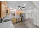 Bright kitchen features updated stainless steel appliances and a view into the dining area at 7137 Wedgewood Dr, New Port Richey, FL 34652