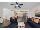 Stylish living area and kitchen boasts hardwood floors and stainless steel appliances at 7137 Wedgewood Dr, New Port Richey, FL 34652