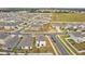 Community aerial view showcasing multiple houses and the street layout at 7380 Sail Clover Ln, Zephyrhills, FL 33540