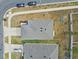 Aerial view of the property showing the roof and surrounding yard space at 7380 Sail Clover Ln, Zephyrhills, FL 33540